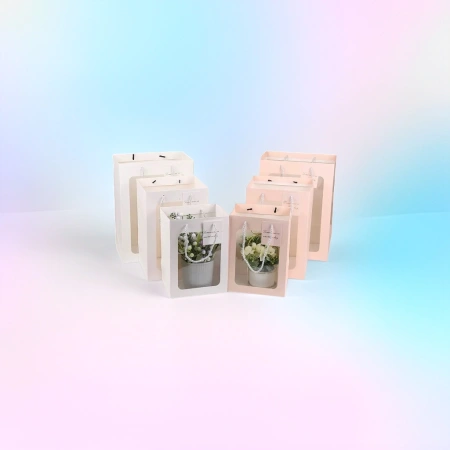 Pink transparent window gift bag, a fashionable and simple hand-held eco-friendly packaging bag Pink transparent window gift bag, a fashionable and simple hand-held eco-friendly packaging bag